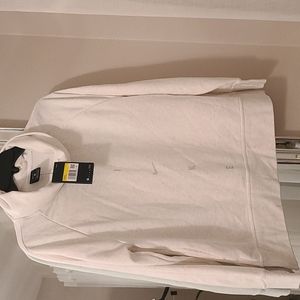 Nike long sleeve cream color sweatshirt with pockets. Size S